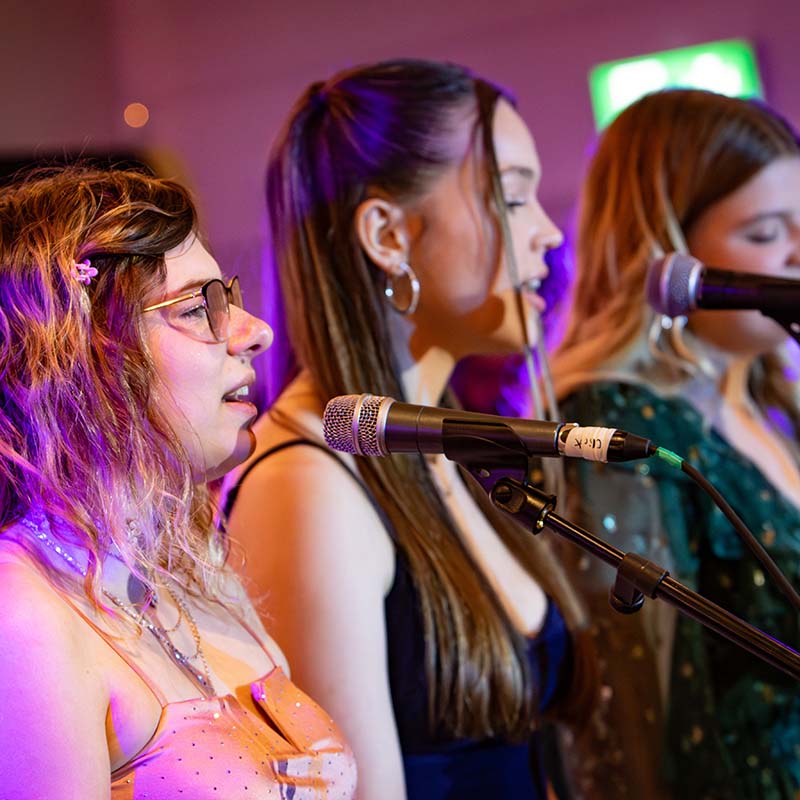 An injured sports member being helped from the pitch