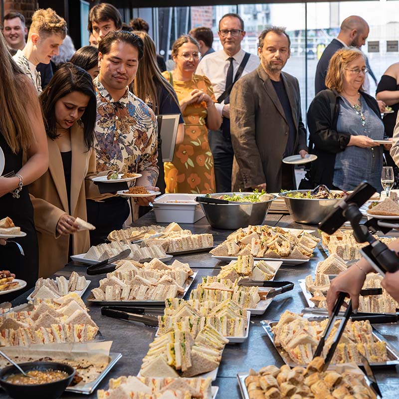 Two students hugging