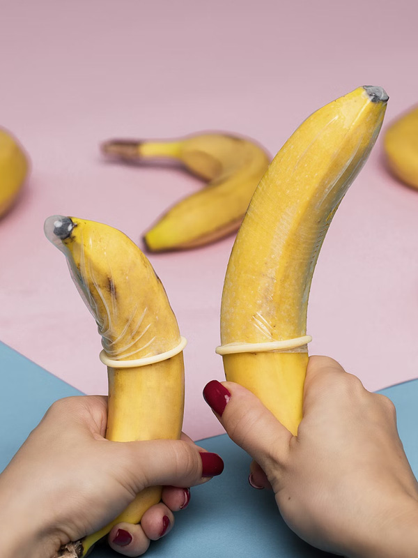 Bananas wearing condoms